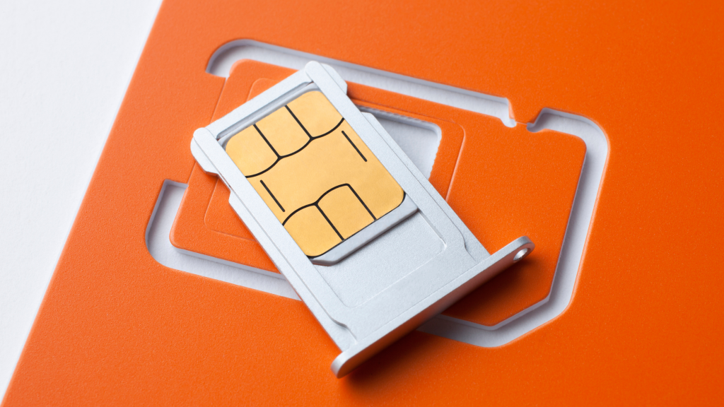SIM Card on Orange SIM Holder Background